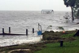 In this image made from a video, rough surf smashes against a dock as Hurricane Hermine nears the Florida coast, Thursday, Sept. 1, 2016, in Carabelle, Fla. Hurricane Hermine gained new strength Thursday evening as it roared closer to Florida's Gulf Coast and people braced for the first direct hit on the state from a hurricane in over a decade. (AP Photo/Joshua Replogle)