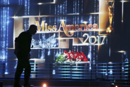 A worker walks across the stage during preparations for the Miss America 2017 pageant, Sunday, Sept. 11, 2016, in Atlantic City, N.J. (AP Photo/Mel Evans)