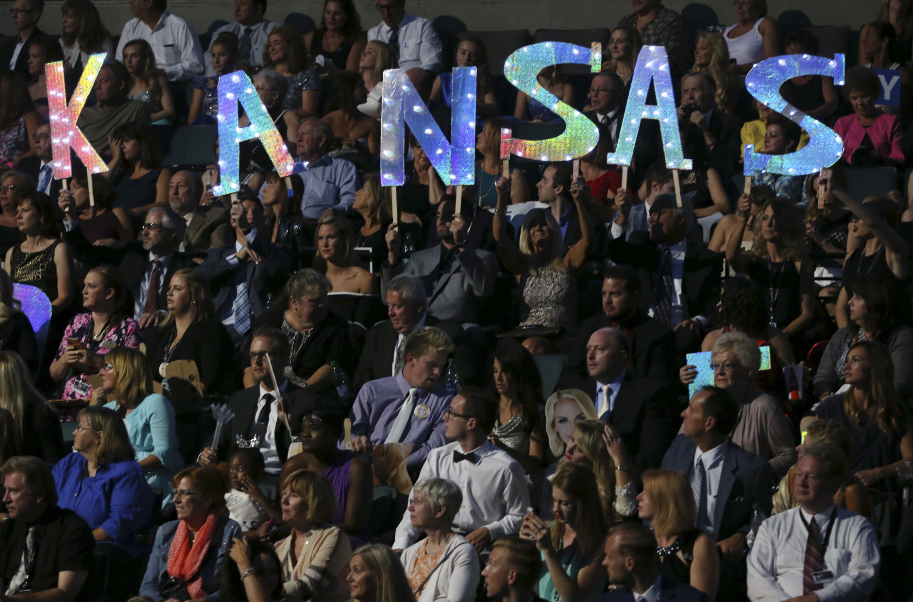 Fans of Miss Kansas Kendall Schoenekase, hold up a sign during the Miss America 2017 pageant, Sunday, Sept. 11, 2016, in Atlantic City, N.J. (AP Photo/Mel Evans)