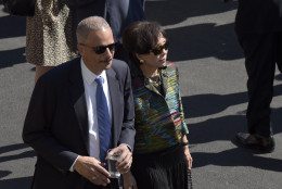 Former Attorney General Eric Holder, left, and Rep. Doris Matsui, D-Calif. attend a reception at the White House in Washington, Friday, Sept. 23, 2016, for the opening of the Smithsonian's National Museum of African American History and Culture. (AP Photo/Susan Walsh)