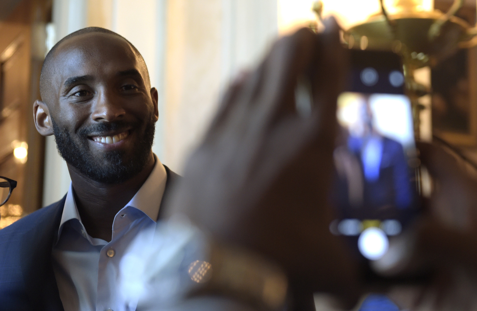 Kobe Bryant poses for a photo during a reception in the Grand Foyer of the White House in Washington, Friday, Sept. 23, 2016, for the opening of the Smithsonian's National Museum of African American History and Culture. (AP Photo/Susan Walsh)