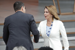 House Speaker Paul Ryan of Wis., left, greets House Minority Leader Nancy Pelosi of Calif. as they take their seats for the dedication ceremony of the Smithsonian Museum of African American History and Culture on the National Mall in Washington, Saturday, Sept. 24, 2016. (AP Photo/Pablo Martinez Monsivais)