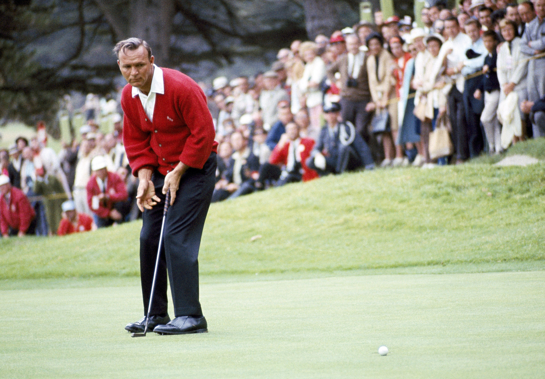 File-This June 19, 1966, file photo shows Arnold Palmer in action during the U.S.Open Golf Championship at Olympic Country Club, San Francisco, Calif.  Palmer, who made golf popular for the masses with his hard-charging style, incomparable charisma and a personal touch that made him known throughout the golf world as "The King," died Sunday, Sept. 25, 2016, in Pittsburgh. He was 87. (AP Photo, File)