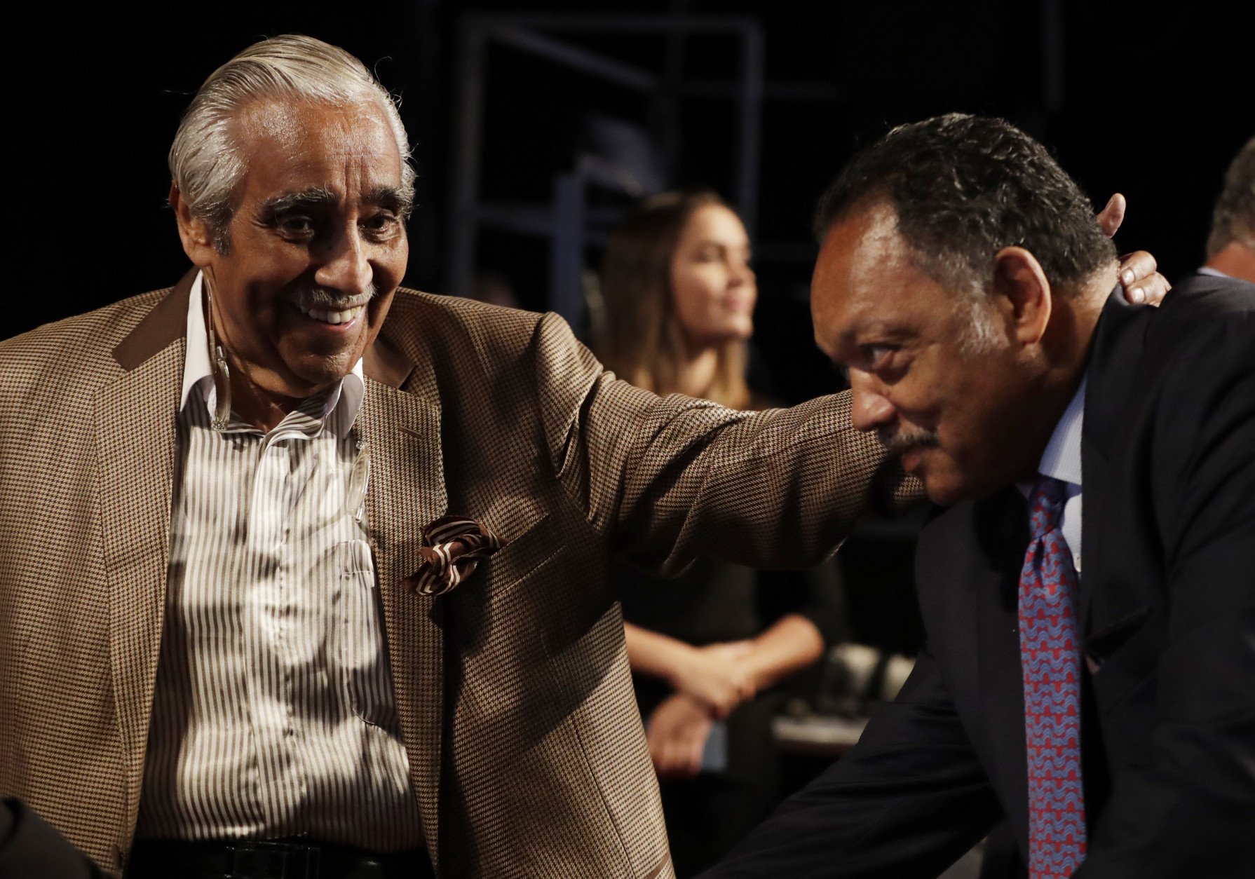 Rep. Charlie Rangel, D-NY, speaks to Jesse Jackson, right, before the presidential debate between Democratic presidential nominee Hillary Clinton and Republican presidential nominee Donald Trump at Hofstra University in Hempstead, N.Y., Monday, Sept. 26, 2016. (AP Photo/Julio Cortez)