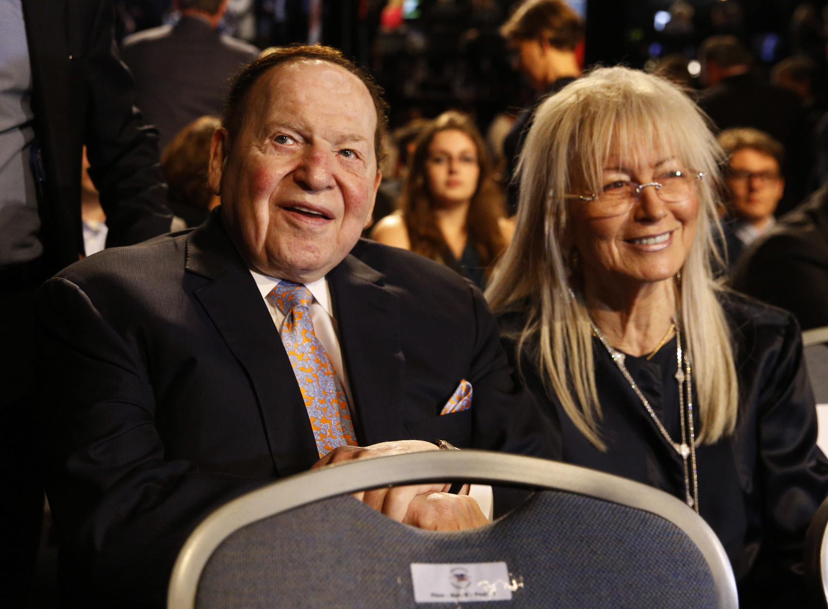 Chief Executive of Las Vegas Sands Corporation Sheldon Adelson sits with his wife Miriam waits for the presidential debate between Democratic presidential nominee Hillary Clinton and Republican presidential nominee Donald Trump at Hofstra University in Hempstead, N.Y., Monday, Sept. 26, 2016. (AP Photo/Patrick Semansky)