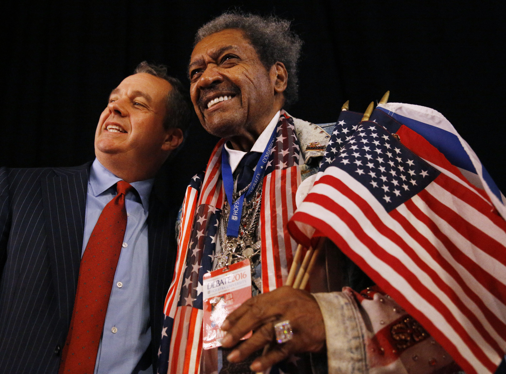 Boxing promoter Don King, right, poses with a guest before the presidential debate between Democratic presidential nominee Hillary Clinton and Republican presidential nominee Donald Trump at Hofstra University in Hempstead, N.Y., Monday, Sept. 26, 2016. (AP Photo/Patrick Semansky)