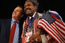 Boxing promoter Don King, right, poses with a guest before the presidential debate between Democratic presidential nominee Hillary Clinton and Republican presidential nominee Donald Trump at Hofstra University in Hempstead, N.Y., Monday, Sept. 26, 2016. (AP Photo/Patrick Semansky)