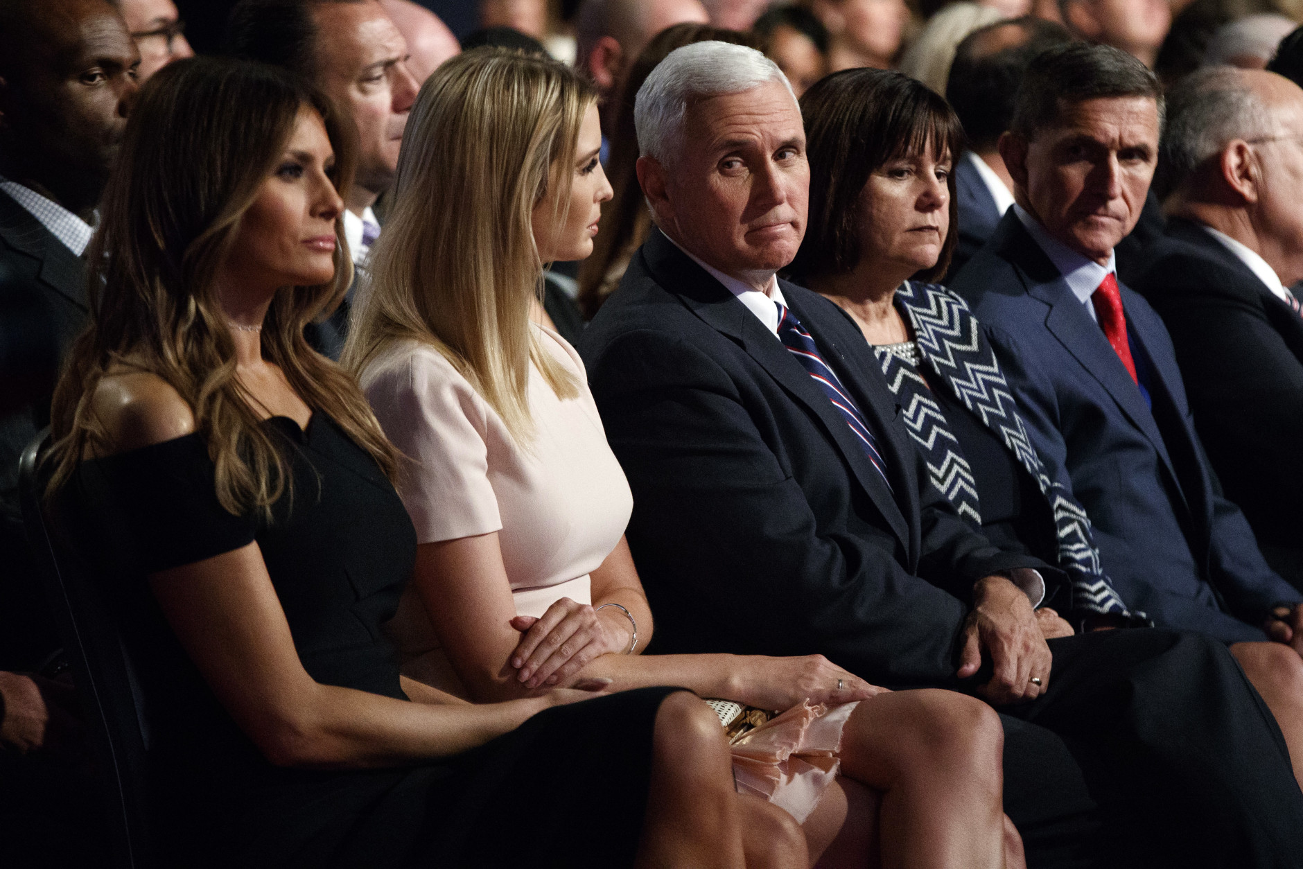 Republican vice presidential candidate Indiana Gov. Mike Pence, center, waits for the start of the first presidential between Republican presidential candidate Donald Trump and Democratic presidential candidate Hillary Clinton at Hofstra University, Monday, Sept. 26, 2016, in Hempstead, N.Y. From left, Melania Trump, Ivanka Trump, Pence, Karen Pence, and retired Gen. Michael Flynn. (AP Photo/ Evan Vucci)