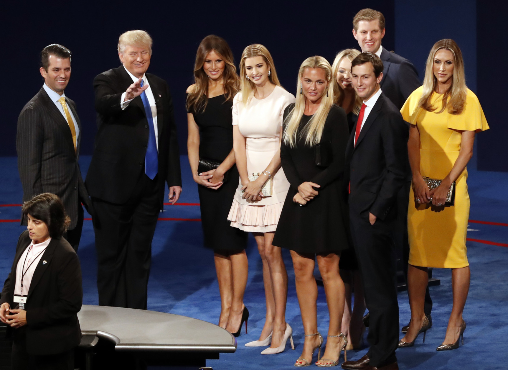 Republican presidential nominee Donald Trump, second from left, his wife Melania Trump, third from left, and family members appear on stage after the presidential debate with Democratic presidential nominee Hillary Clinton at Hofstra University in Hempstead, N.Y., Monday, Sept. 26, 2016. (AP Photo/Mary Altaffer)