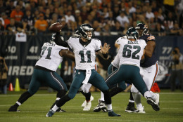 Philadelphia Eagles quarterback Carson Wentz (11) throws a pass during the first half of an NFL football game against the Chicago Bears, Monday, Sept. 19, 2016, in Chicago. (AP Photo/Nam Y. Huh)