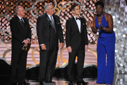 Leslie Jones, right, and accountants from Ernst &amp; Young appear on stage at the 68th Primetime Emmy Awards on Sunday, Sept. 18, 2016, at the Microsoft Theater in Los Angeles. (Photo by Vince Bucci/Invision for the Television Academy/AP Images)