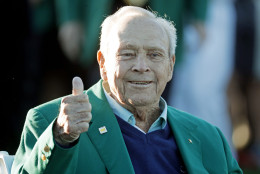 Arnold Palmer gives a thumbs up before the ceremonial first tee before the first round of the Masters golf tournament Thursday, April 7, 2016, in Augusta, Ga. Palmer, who made golf popular for the masses with his hard-charging style, incomparable charisma and a personal touch that made him known throughout the golf world as "The King," died Sunday, Sept. 25, 2016, in Pittsburgh. He was 87. (AP Photo/Charlie Riedel)