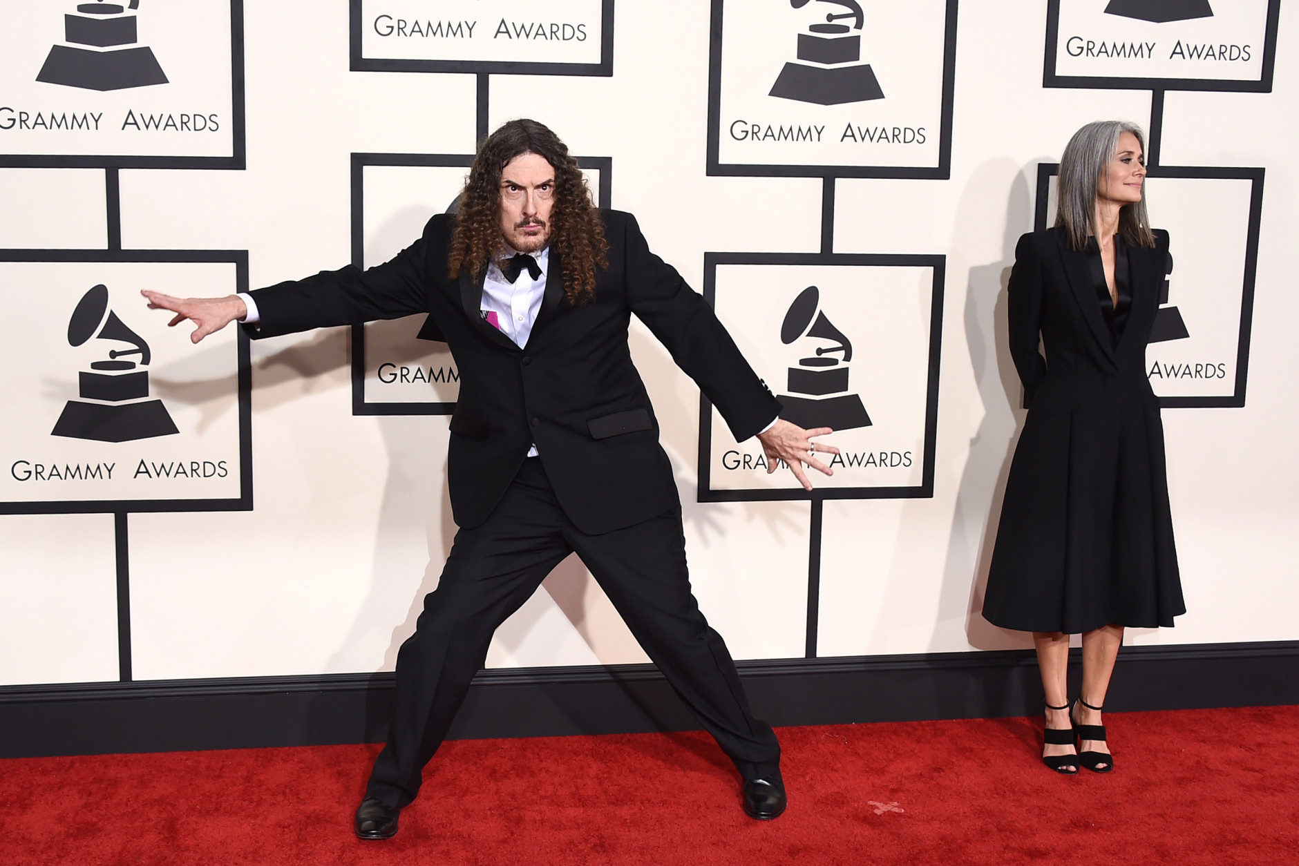 "Weird Al" Yankovic, left and Suzanne Krajewski arrive at the 57th annual Grammy Awards at the Staples Center on Sunday, Feb. 8, 2015, in Los Angeles. (Photo by Jordan Strauss/Invision/AP)