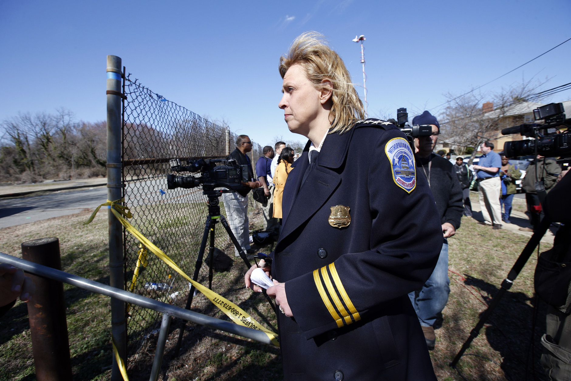 Washington Police Chief Cathy Lanier leaves after speaking during a media availability about a body found in Kenilworth Park, Monday, March 31, 2014, in Washington. Police have been searching the park in northeast Washington since last week for clues in the case of eight-year-old Relisha Rudd, last seen in the company of Kahlil Tatum, a janitor at the homeless shelter where she lived with her mother and brothers.(AP Photo/Alex Brandon)