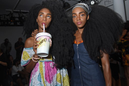Twin sisters TK, left, and Cipriana Quann attend the Adam Selman Spring 2017 show at Fashion Week in New York, Thursday, Sept. 8, 2016.  (AP Photo/Diane Bondareff)