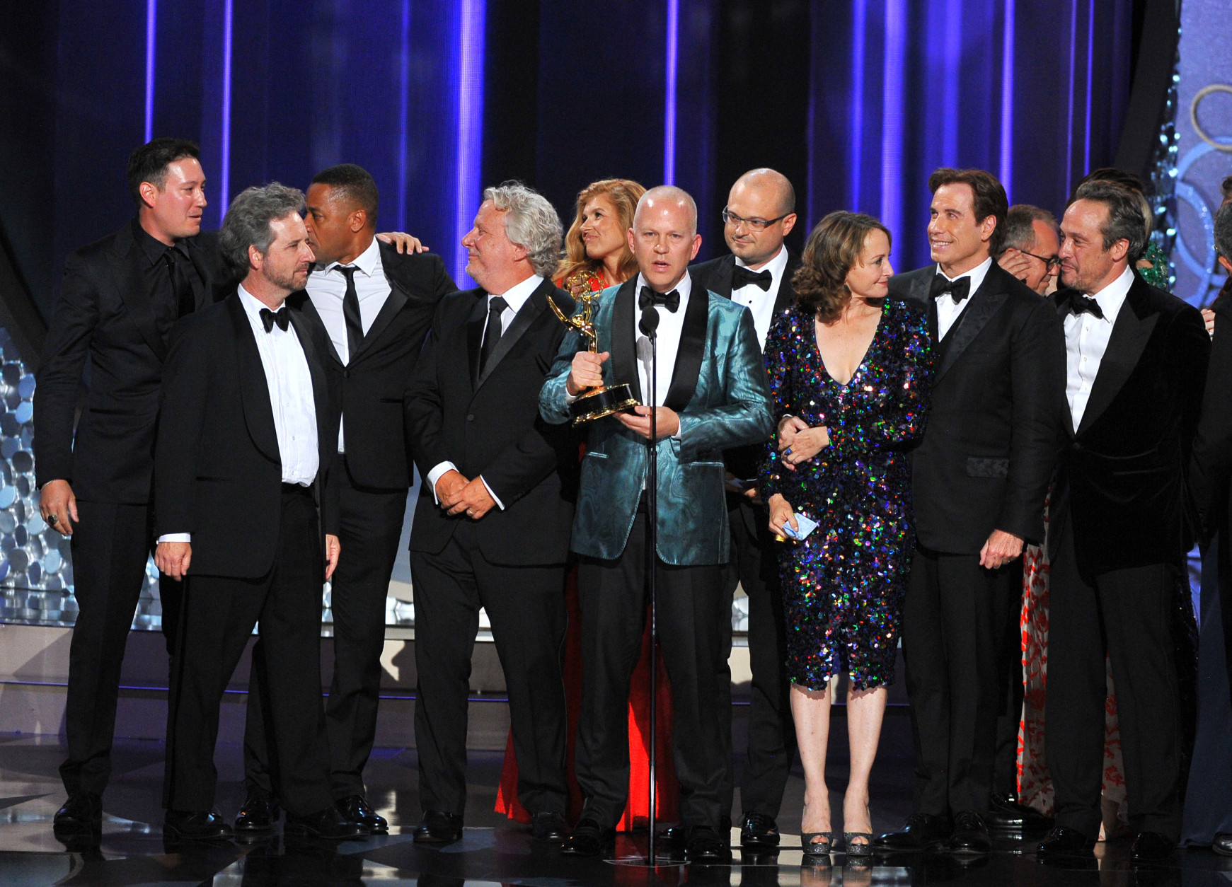 Ryan Murphy and the cast and crew of The People v. O.J. Simpson: American Crime Story accept the award for outstanding limited series at the 68th Primetime Emmy Awards on Sunday, Sept. 18, 2016, at the Microsoft Theater in Los Angeles. (Photo by Vince Bucci/Invision for the Television Academy/AP Images)