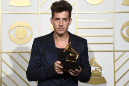 Mark Ronson poses in the press room with the award for best pop duo/group performance for Uptown Funk at the 58th annual Grammy Awards at the Staples Center on Monday, Feb. 15, 2016, in Los Angeles. (Photo by Chris Pizzello/Invision/AP)