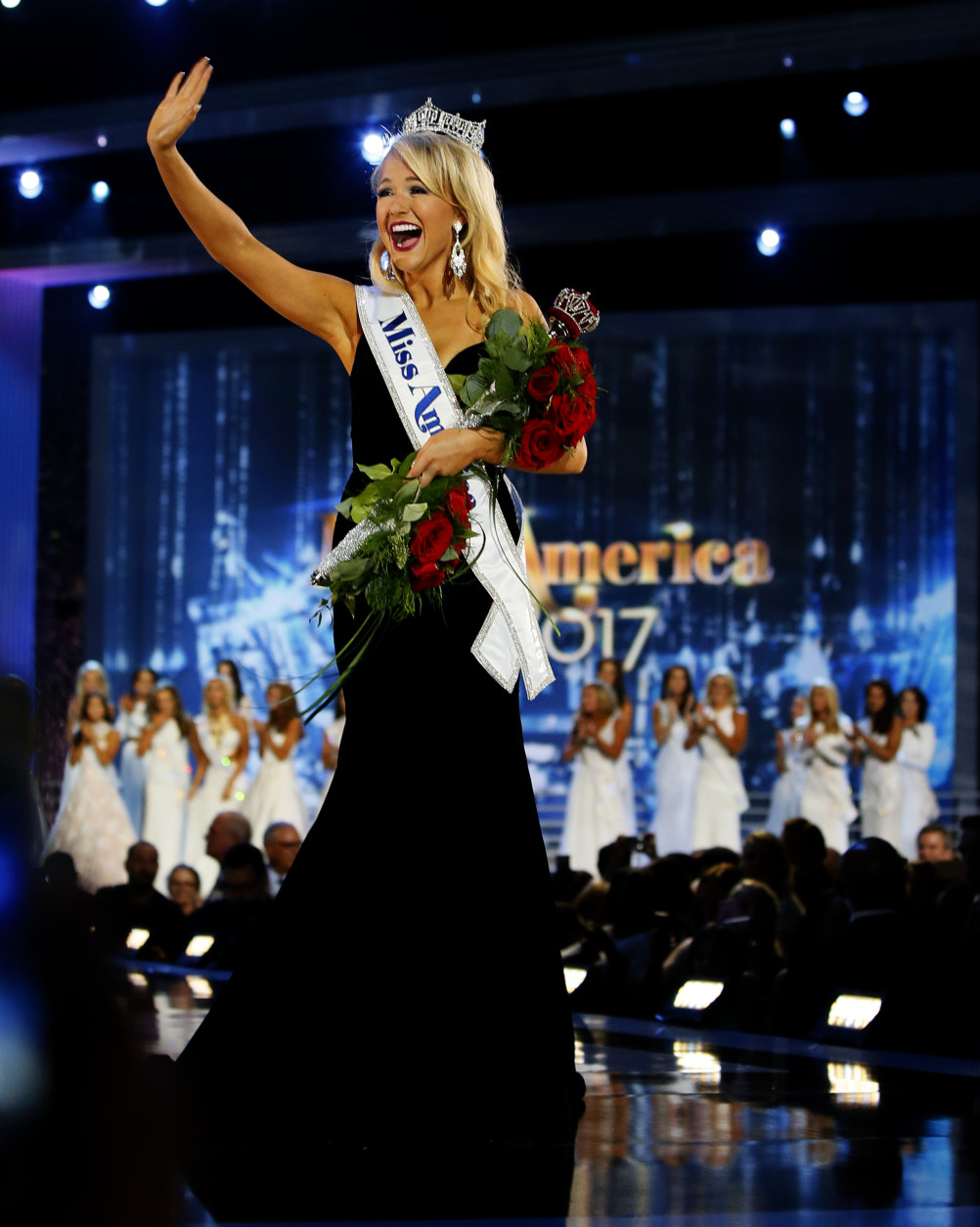 Miss Arkansa Savvy Shields waves to crowd after being named new the Miss America 2017, Sunday, Sept. 11, 2016, in Atlantic City, N.J. (AP Photo/Noah K. Murray)