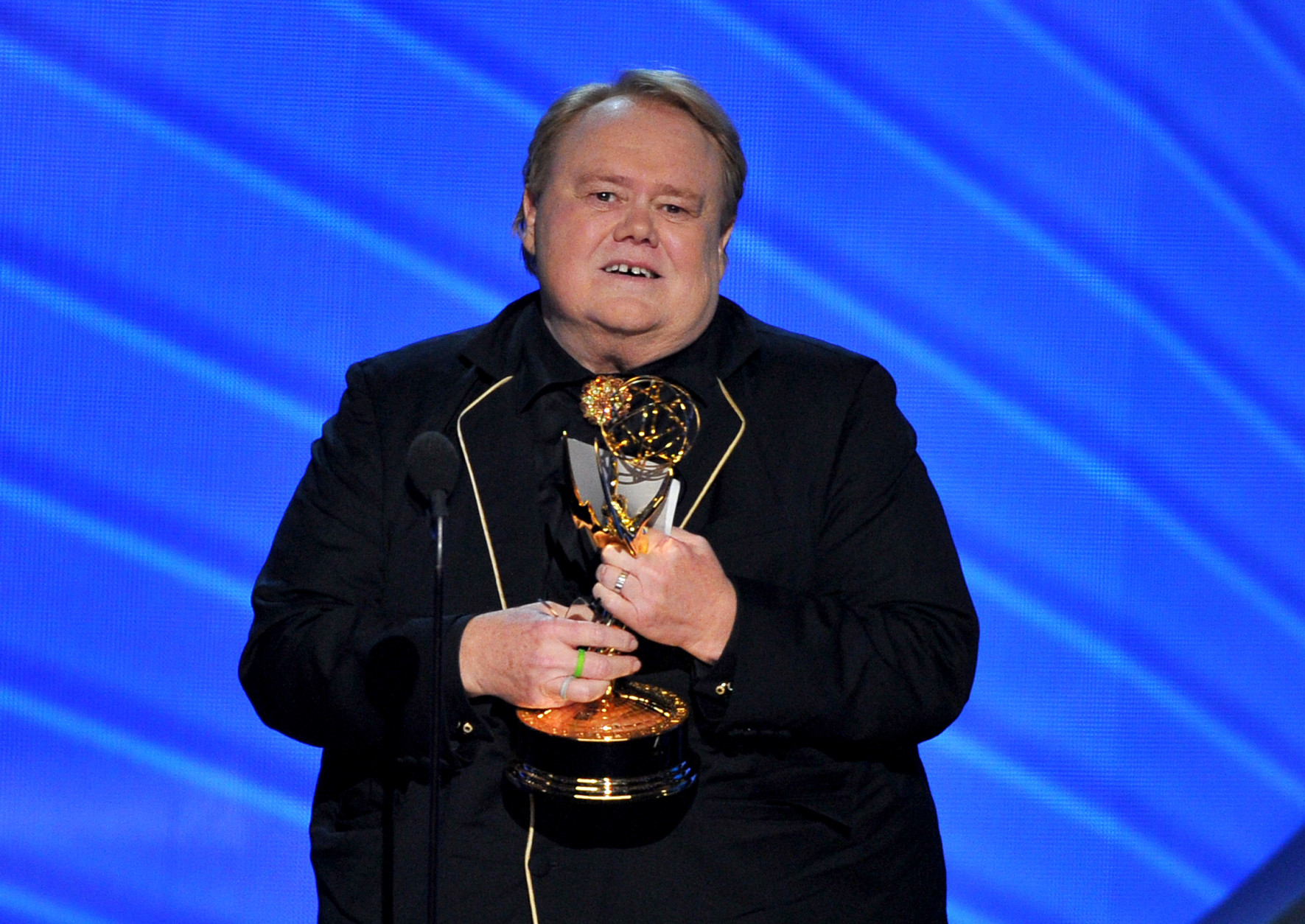 Louis Anderson accepts the award for outstanding supporting actor in a comedy series for Baskets at the 68th Primetime Emmy Awards on Sunday, Sept. 18, 2016, at the Microsoft Theater in Los Angeles. (Photo by Vince Bucci/Invision for the Television Academy/AP Images)