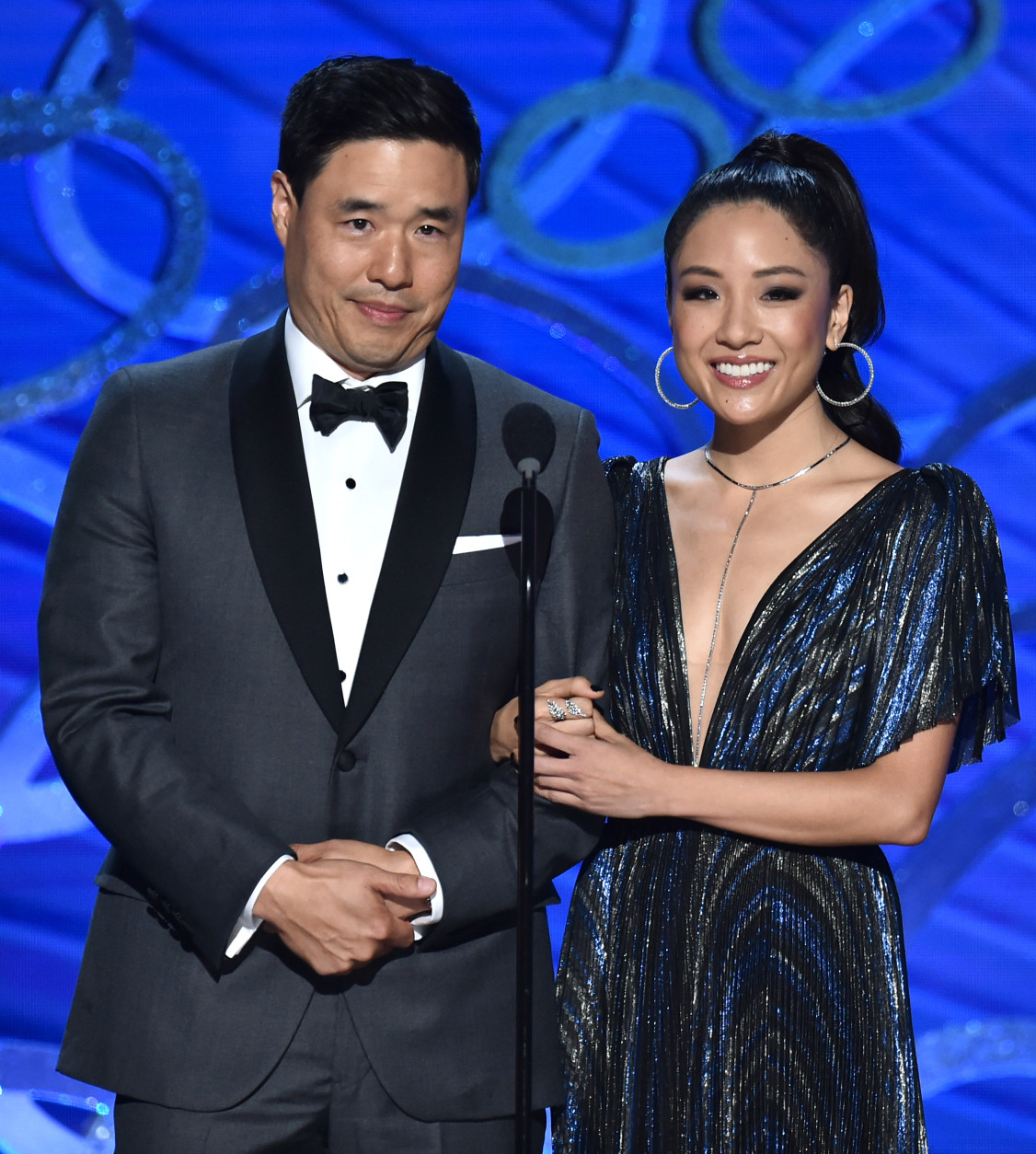 Randall Park, left, and Constance Wu speak at the 68th Primetime Emmy Awards on Sunday, Sept. 18, 2016, at the Microsoft Theater in Los Angeles. (Photo by Vince Bucci/Invision for the Television Academy/AP Images)