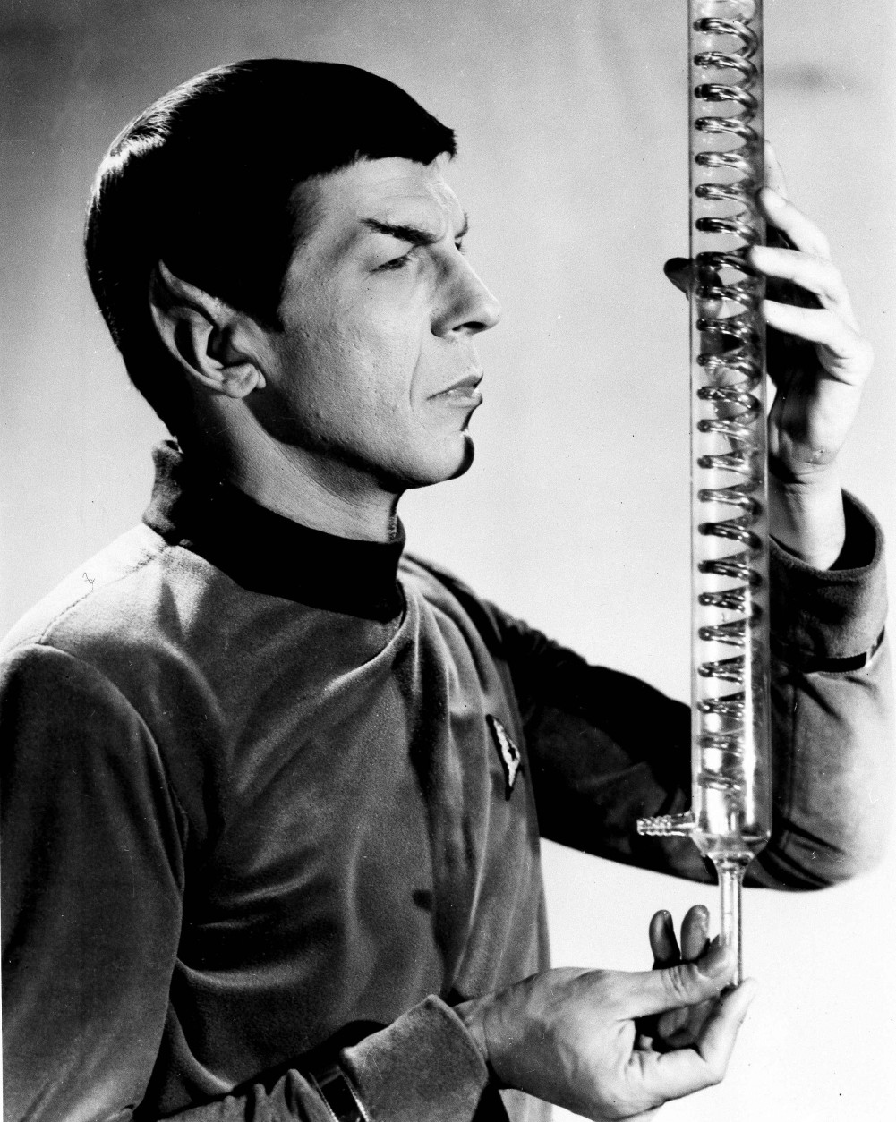His role interests him but his make-up literally irritates Leonard Nimoy, the half-Vulcan, half-earthling scientist of the television series "Star Trek", shown May 11, 1967. His pointed ears are built up with bits of plastic, and no matter how carefully it's done, they are rubbed sore as he moves. Nimoy is pictured in an episode of the series. (AP Photo)