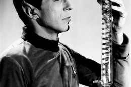 His role interests him but his make-up literally irritates Leonard Nimoy, the half-Vulcan, half-earthling scientist of the television series "Star Trek", shown May 11, 1967. His pointed ears are built up with bits of plastic, and no matter how carefully it's done, they are rubbed sore as he moves. Nimoy is pictured in an episode of the series. (AP Photo)