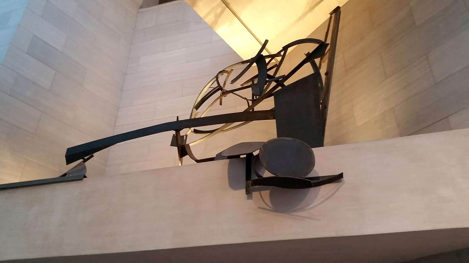 Sir Anthony Caro designed this sculpture for the ledge space in the East Building of the National Gallery of Art. (WTOP/Kathy Stewart)