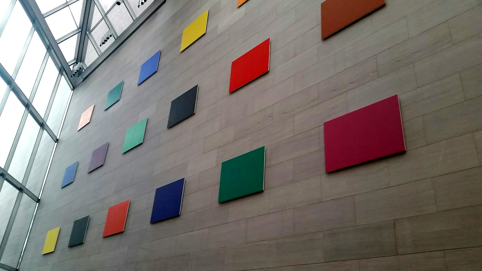 Wall panels by Ellsworth Kelly, an American painter, sculptor and printmaker, hang in the East Building of the National Gallery of Art. They were originally displayed in a bank. (WTOP/Kathy Stewart)