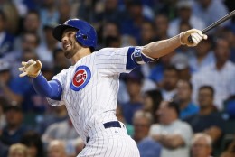 Chicago Cubs' Kris Bryant follows through on a solo home run during the first inning of a baseball game against the Pittsburgh Pirates on Wednesday, Aug. 31, 2016, in Chicago. (AP Photo/Nam Y. Huh)