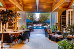 The 25-acre secluded estate comes with a pool, cabana, game room, indoor basketball court and batting cage. (Courtesy Monument Sotheby's International Realty)