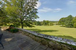 This photo provided by Thomas and Talbot Real Estate shows a  large pond that lies on the more than 166-acres Wexford Estate in Marshall, Virginia. Nestled on the property is the 1963 retreat that Jacqueline Kennedy Onassis designed for her family. The property is selling for $5.9 million. (Courtesy Thomas and Talbot Real Estate and Mona Botwick Photography)