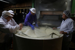 HIMEJI, JAPAN - JANUARY 24:  Japanese sake brewery workers prepare to remove freshly steamed rice in preparation for making sake at Tanaka Sake Brewery on January 24, 2014 in Himeji, Japan. Japanese Prime Minister Shinzo Abe targets 60 billion yen by 2020, a fivefold increase in rice-based product exports including sake.  (Photo by Buddhika Weerasinghe/Getty Images).  (Photo by Buddhika Weerasinghe/Getty Images)