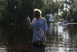ST MARKS, FL - SEPTEMBER 2:  A resident surveys damage around his home from high winds and storm surge associated with Hurricane Hermine which made landfall overnight in the area on September 2, 2016 in St. Marks, Florida. Hermine made landfall as a Category 1 hurricane but has weakened back to a tropical storm. (Photo by Brian Blanco/Getty Images)