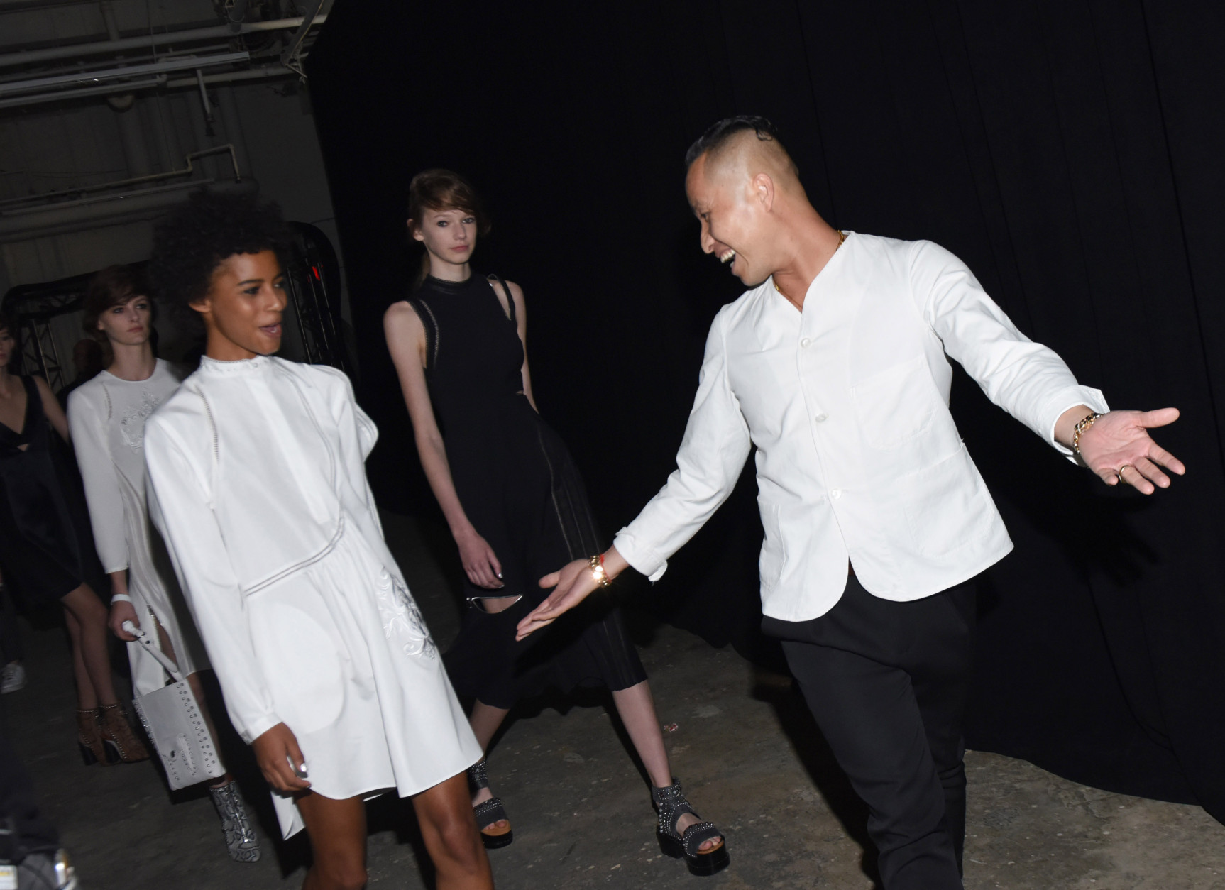 NEW YORK, NY - SEPTEMBER 12:  Fashion designer Phillip Lim and models backstage at 3.1 Phillip Lim during New York Fashion Week 2016 at Skylight Clarkson North on September 12, 2016 in New York City.  (Photo by Vivien Killilea/Getty Images)
