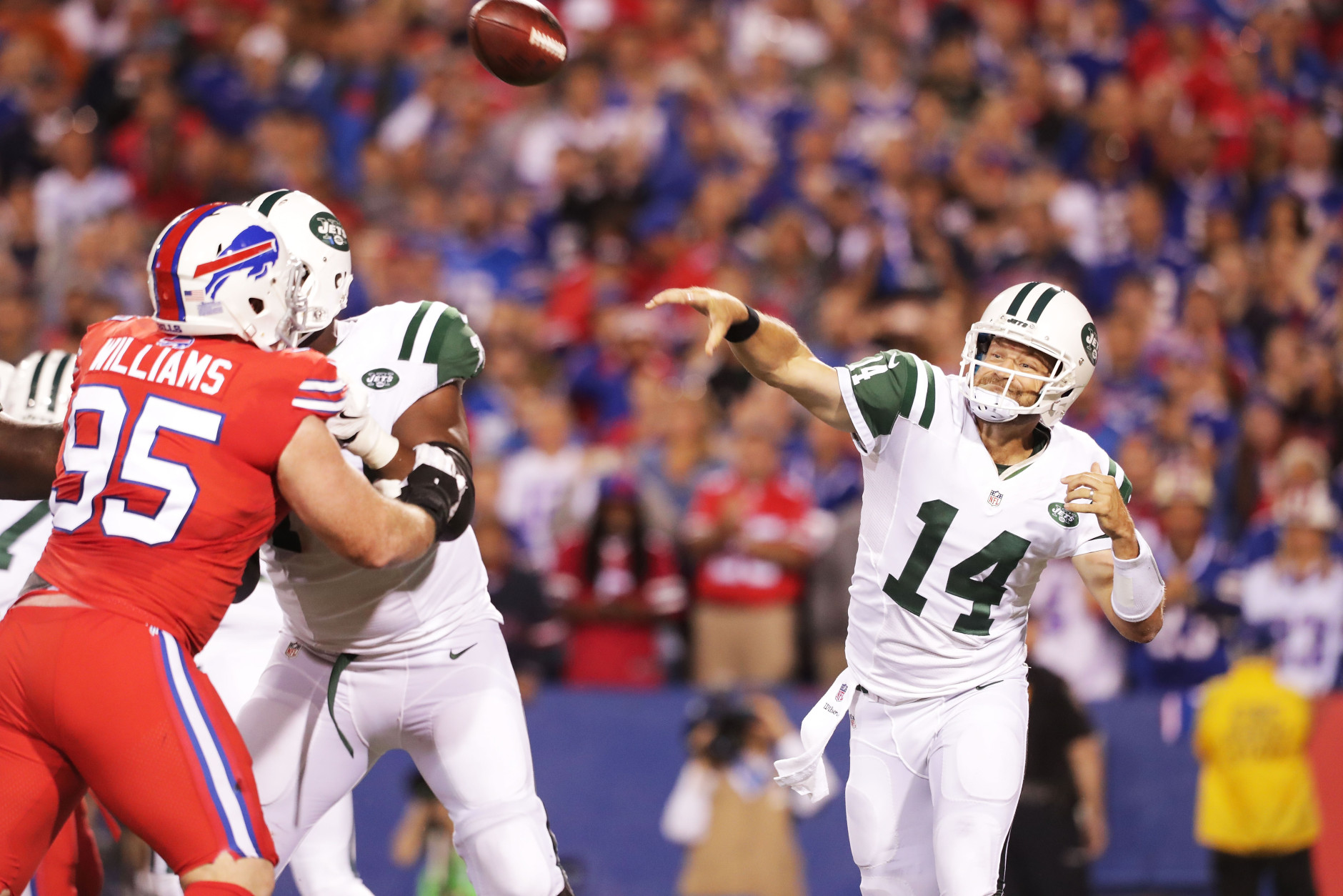 ORCHARD PARK, NY - SEPTEMBER 15:  Ryan Fitzpatrick #14 of the New York Jets throws a pass against the Buffalo Bills during the first half at New Era Field on September 15, 2016 in Orchard Park, New York.  (Photo by Brett Carlsen/Getty Images)