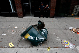 NEW YORK, NY - SEPTEMBER 18: A mangled dumpster sits on the sidewalk at the site of an explosion that occurred on Saturday night on September 18, 2016 in the Chelsea neighborhood of New York City. An explosion in a construction dumpster that injured 29 people is being labeled an "intentional act". A second device, a pressure cooker, was found four blocks away that an early investigation found was likely also a bomb. (Photo by Justin Lane-Pool/Getty Images)