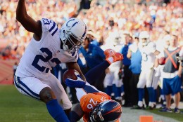 DENVER, CO - SEPTEMBER 18:  Running back Frank Gore #23 of the Indianapolis Colts shrugs off free safety Darian Stewart #26 of the Denver Broncos to score a touchdown in the fourth quarter of the game at Sports Authority Field at Mile High on September 18, 2016 in Denver, Colorado. (Photo by Dustin Bradford/Getty Images)