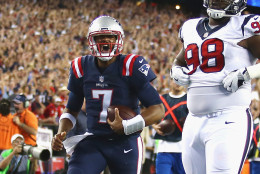 FOXBORO, MA - SEPTEMBER 22:  Jacoby Brissett #7 of the New England Patriots celebrates scoring a touchdown during the first quarter against the Houston Texans at Gillette Stadium on September 22, 2016 in Foxboro, Massachusetts.  (Photo by Adam Glanzman/Getty Images)