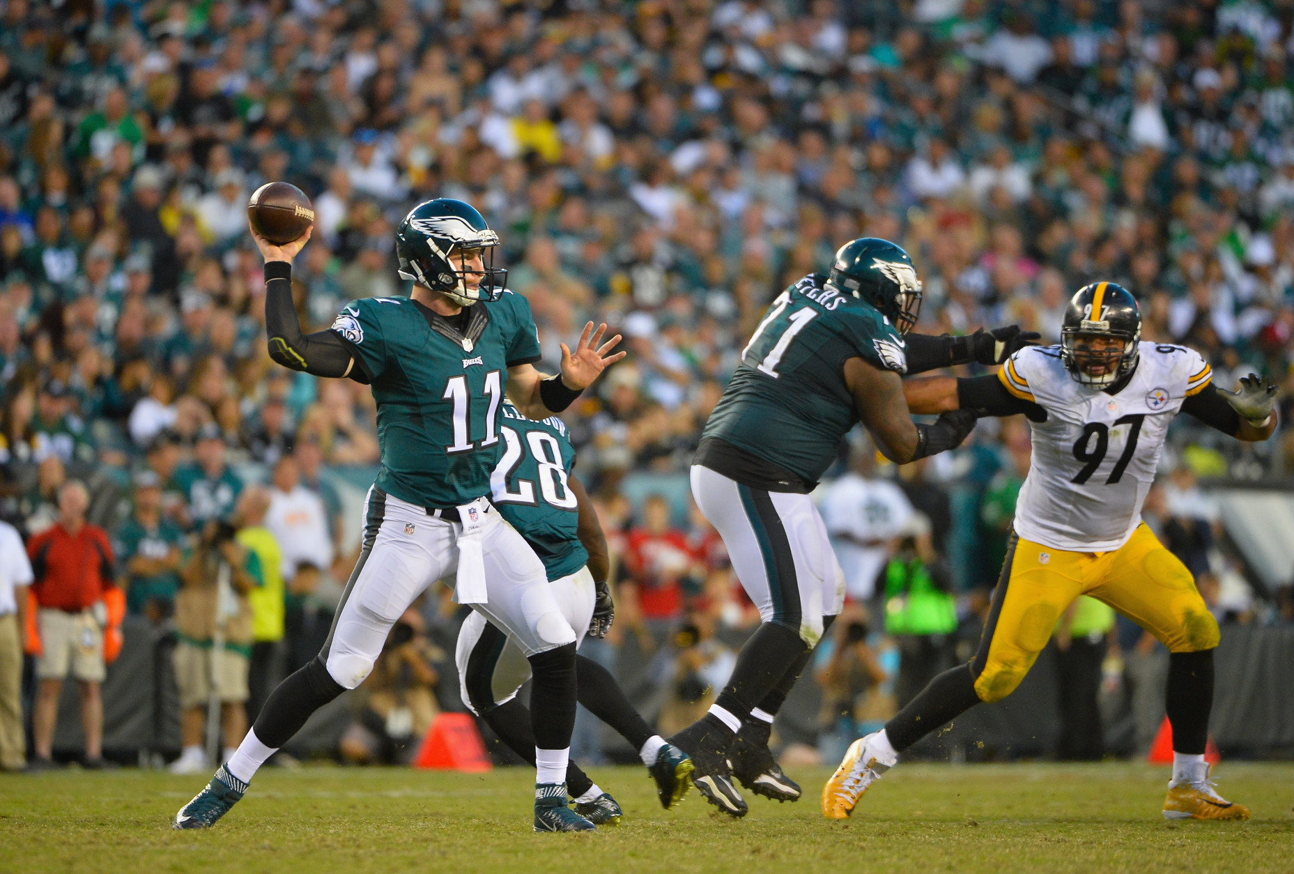 PHILADELPHIA, PA - SEPTEMBER 25:   Quarterback Carson Wentz #11 of the Philadelphia Eagles looks to pass against the Pittsburgh Steelers in the fourth quarter at Lincoln Financial Field on September 25, 2016 in Philadelphia, Pennsylvania.  (Photo by Alex Goodlett/Getty Images)
