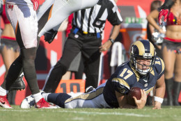 TAMPA, FL - SEPTEMBER 25:  Los Angeles Rams quarterback Case Keenum #17 looks to make sure he made a first down during the first half of their NFL football game against the Tampa Bay Buccaneers at Raymond James Stadium on September 25, 2016 in Tampa, Florida. The Rams defeated the Bucs 37-32.   (Photo by Mark Wallheiser/Getty Images)