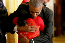 WASHINGTON, DC - SEPTEMBER 29:  U.S. President Barack Obama hugs Olympian Simone Biles during an East Room event at the White House September 29, 2016 in Washington, DC. President Obama and first lady Michelle Obama welcome the 2016 U.S. Olympic and Paralympic teams to the White House to honor their participation and success in the Rio Olympic Games this year.  (Photo by Elsa/Getty Images)