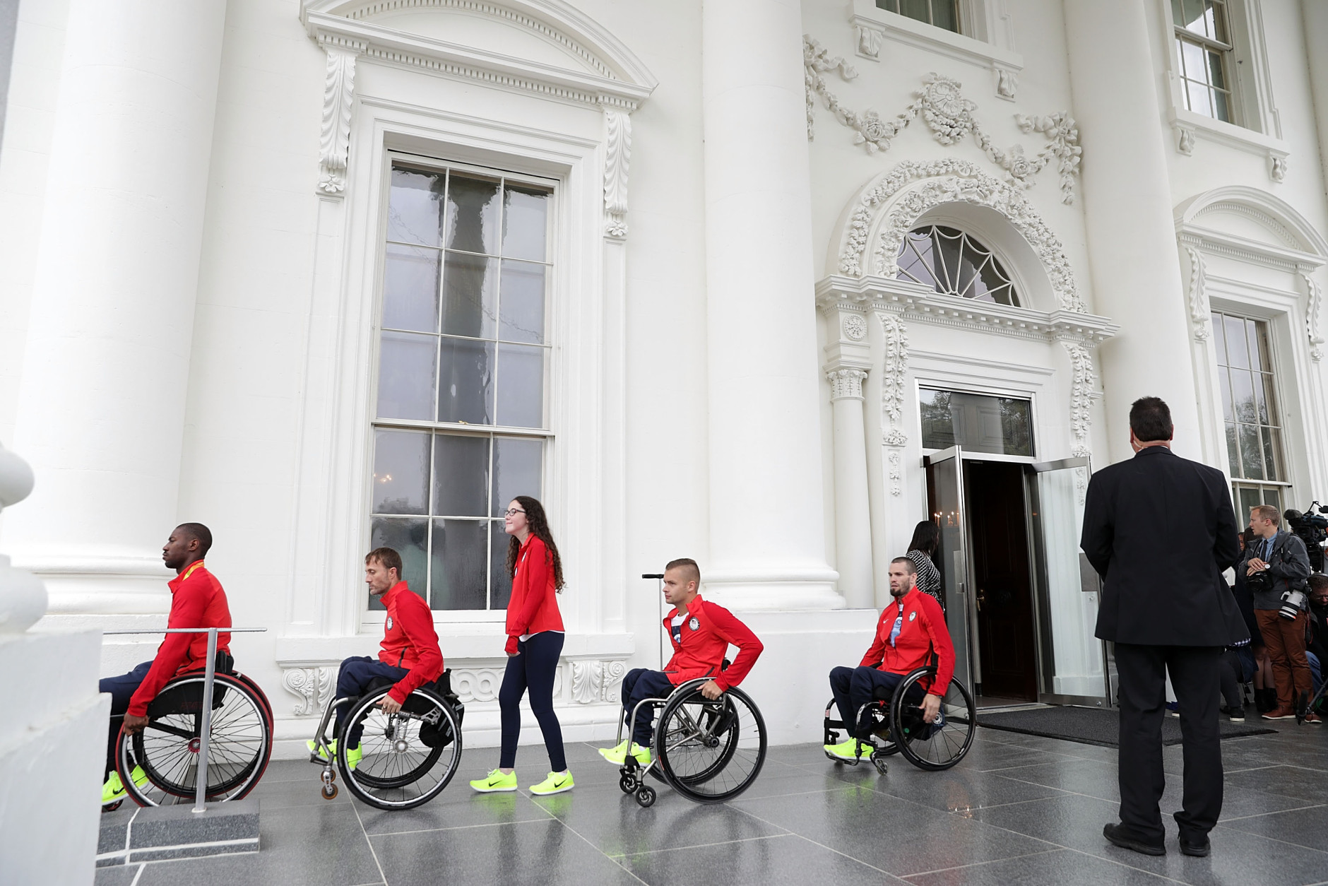 WASHINGTON, DC - SEPTEMBER 29:  Members of the U.S. Paralympic team leave the North Portico after an East Room event at the White House September 29, 2016 in Washington, DC. President Barack Obama and first lady Michelle Obama welcome the 2016 U.S. Olympic and Paralympic teams to the White House to honor their participation and success in the Rio Olympic Games this year.  (Photo by Alex Wong/Getty Images)