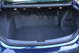 Trunk space does suffer in the hybrid version but it’s still useable. Large items might have to ride in the back seat. (WTOP/Mike Parris)