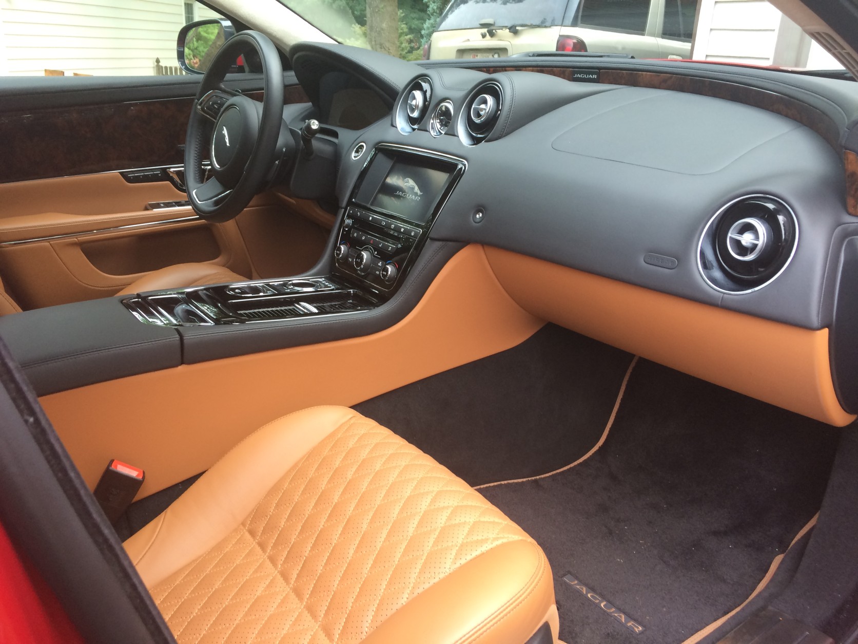 Made of high-quality quilted leather, the front seats of the 2016 Jaguar XJL Portfolio have massage. The sedan has heated and cooled front and rear seats. (WTOP/Mike Parris)