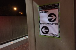 These signs incorrectly labelled the direction Metrorail trains were headed, causing confusion for commuters at the West Falls Church station in Virginia on Thursday, Sept. 15, 2016. (WTOP/Neal Augenstein)