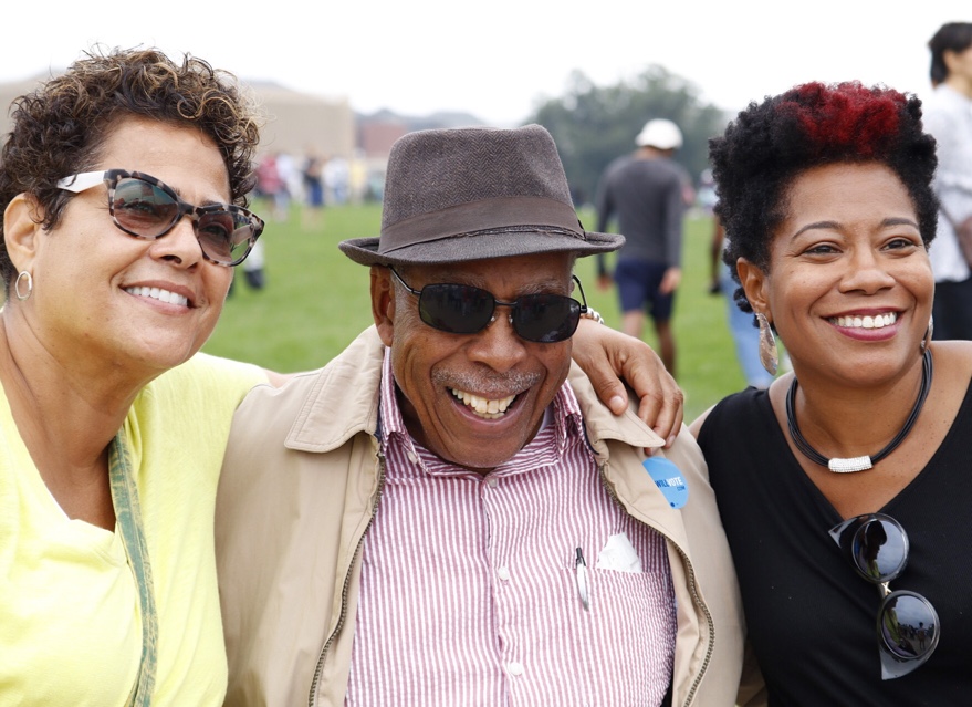 Three people attending the opening day festivities at the National Museum of African American History and Culture did not know each other at the beginning of the day, but ended up spending the day enjoying each other's company Saturday, Sept. 24, 2016. (WTOP/Kate Ryan)