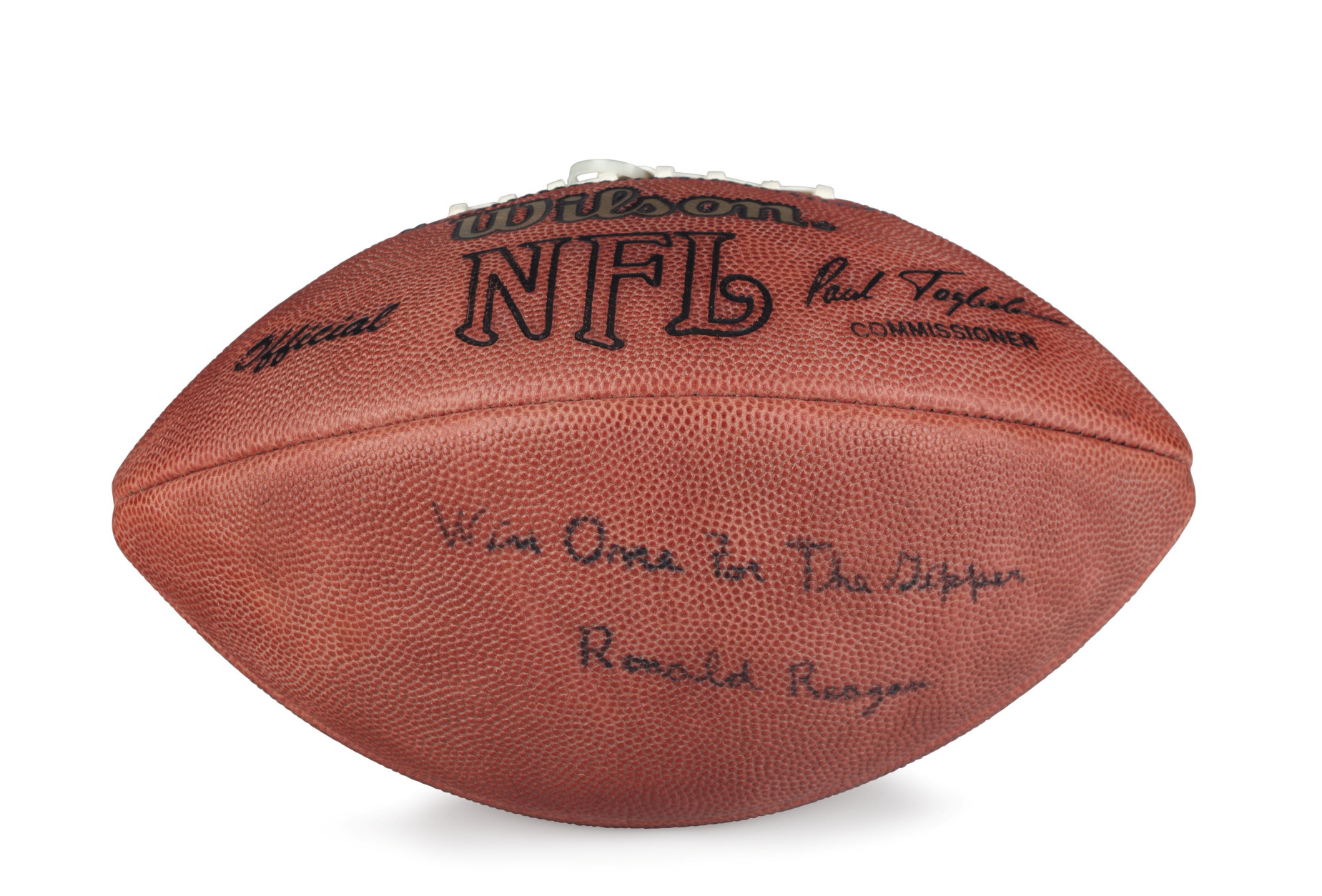 This official NFL football is signed "Win one for the Gipper, Ronald Reagan." and is among the items that will sell at auction this week. Christie's will auction more than 700 belongings of Ronald and Nancy Reagan that came from their Los Angeles ranch-style home, where they moved after leaving the White House in 1989. (Courtesy Christie's)