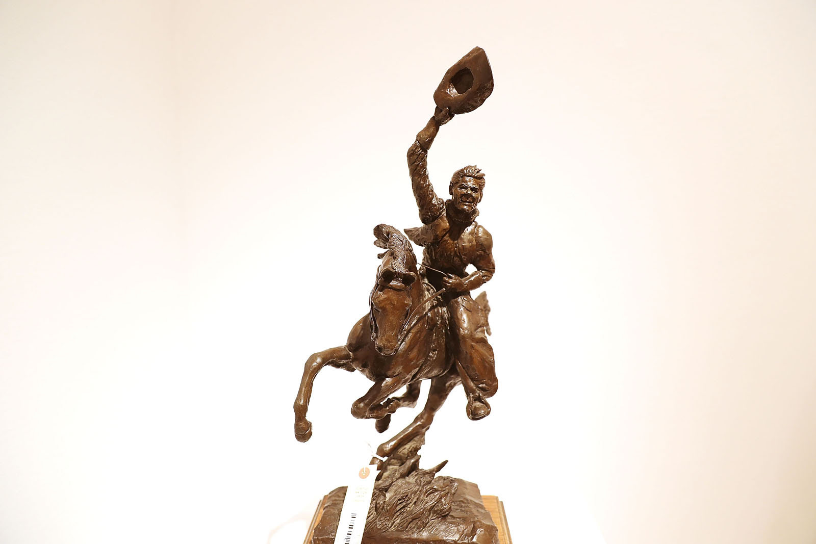 NEW YORK, NY - SEPTEMBER 16:  A bronze miniture sculpture of Ronald Reagan on a horse is displayed at Christie's where items from the former president and Nancy Reagan's California home are to be auctioned shortly on September 16, 2016 in New York City. Many personal items of the first couple are to be auctioned including "Hollywood Regency"style furniture and light fixtures, decorative works, handbags, porcelain stamped with the presidential seal, jewelry and a pair of Reagan's cowboy boots with the presidential seal. The e-catalog auction, which is expected to generate more than $2 million with individual items ranging from $1,000 to $50,000, goes live at Christie's Monday in New York. Proceeds from the auction will be donated to the Ronald Reagan Presidential Foundation and Institute.  (Photo by Spencer Platt/Getty Images)