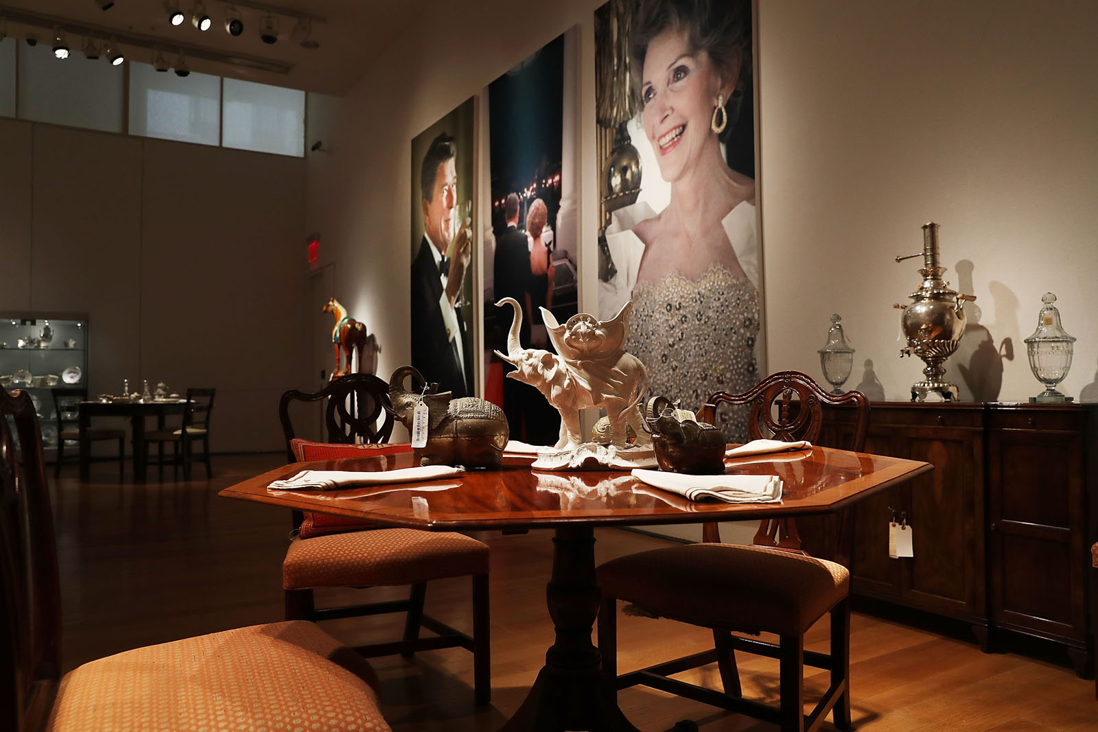 NEW YORK, NY - SEPTEMBER 16:  Furniture and other items are displayed at Christie's where items from the former president and Nancy Reagan's California home are to be auctioned shortly on September 16, 2016 in New York City. Many personal items of the first couple are to be auctioned including "Hollywood Regency"style furniture and light fixtures, decorative works, handbags, porcelain stamped with the presidential seal, jewelry and a pair of Reagan's cowboy boots with the presidential seal. The e-catalog auction, which is expected to generate more than $2 million with individual items ranging from $1,000 to $50,000, goes live at Christie's Monday in New York. Proceeds from the auction will be donated to the Ronald Reagan Presidential Foundation and Institute.  (Photo by Spencer Platt/Getty Images)