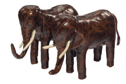 This undated photo provided by Christie's shows a pair of English cowhide leather elephant-shaped ottomans. The ottomans, which will be sold by Christie's New York during a two-day auction of the contents of Ronald and Nancy Reagan's ranch-style home in California, have a pre-sale estimate of $2,000-$3,000. Christieâ€™s announced Thursday, June 30, 2016, highlights of the Sept. 21-22 sale in New York City. (Christie's via AP) MANDATORY CREDIT